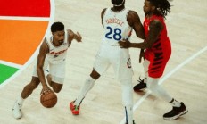 开云官网-76人主场击败奇才，西蒙斯贡献25分